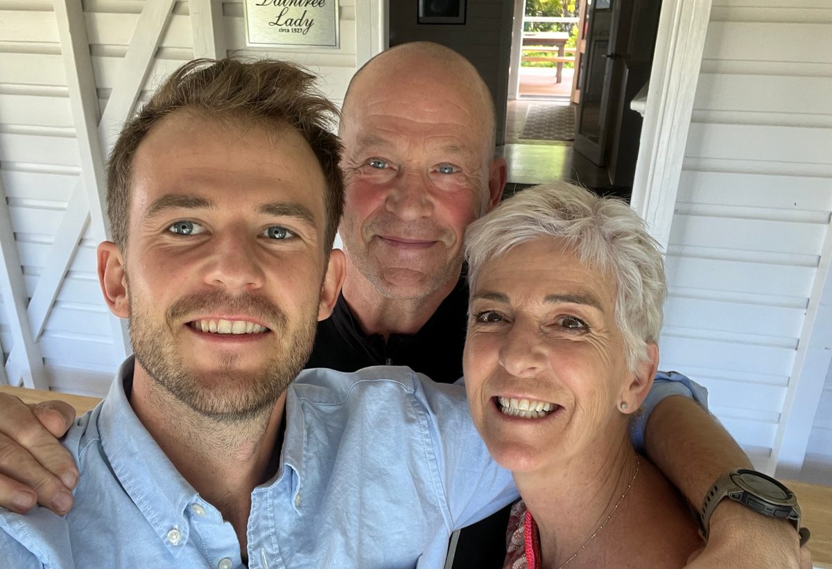 Barney with his mother and father on the verandah at home